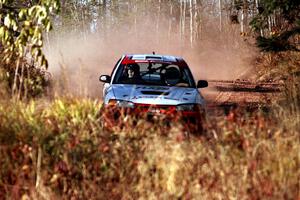 Garen Shrader / Michael Fennell Mitsubishi Lancer Evo IV at speed near the end of SS17, Gratiot Lake II.