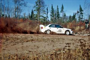 Seamus Burke / Frank Cunningham Mitsubishi Lancer Evo IV at speed near the end of SS17, Gratiot Lake II.