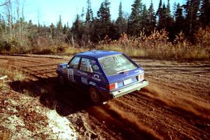 Mark Utecht / Brenda Corneliusen Dodge Omni GLH Turbo at speed near the end of SS17, Gratiot Lake II.