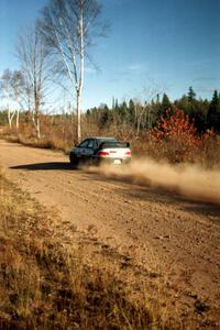 Lon Peterson / Bill Gutzmann Subaru Impreza 2.5RS at speed near the end of SS17, Gratiot Lake II.