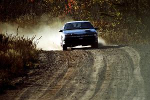 Dennis Martin / Chris Plante Mitsubishi Eclipse GSX at speed near the end of SS17, Gratiot Lake II.