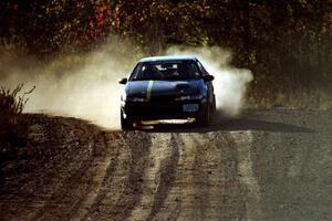 Steve Nielsen / Lisa Parker Plymouth Laser at speed near the end of SS17, Gratiot Lake II.