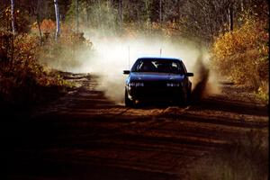 Anthony Grinnell / Kim Young Chevy Beretta at speed near the end of SS17, Gratiot Lake II.