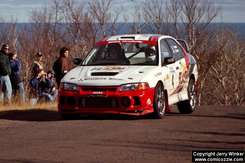 Garen Shrader / Michael Fennell Mitsubishi Lancer Evo IV at the final yump on SS13, Brockway Mountain.