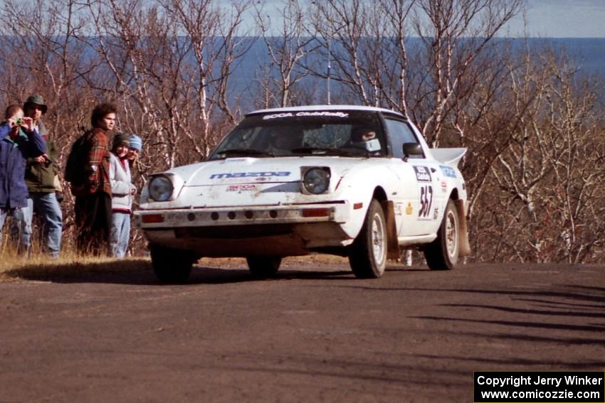 Steve Nowicki / David Stone Mazda RX-7 at the final yump on SS13, Brockway Mountain.