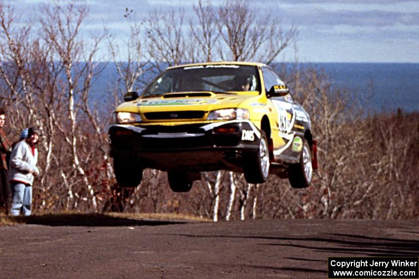 Pat Richard / Ben Bradley Subaru Impreza 2.5RS catch big air at the final yump on SS13, Brockway Mountain.