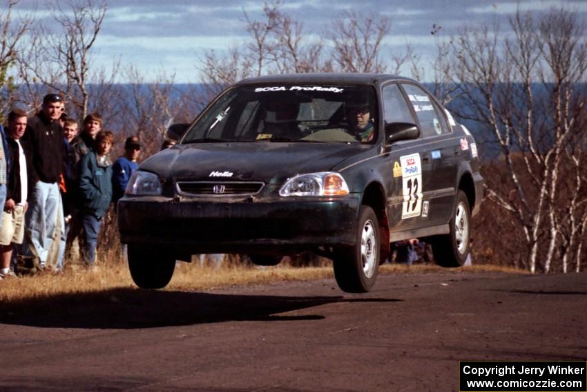 Nick Robinson / Carl Lindquist Honda Civic at the final yump on SS13, Brockway Mountain.