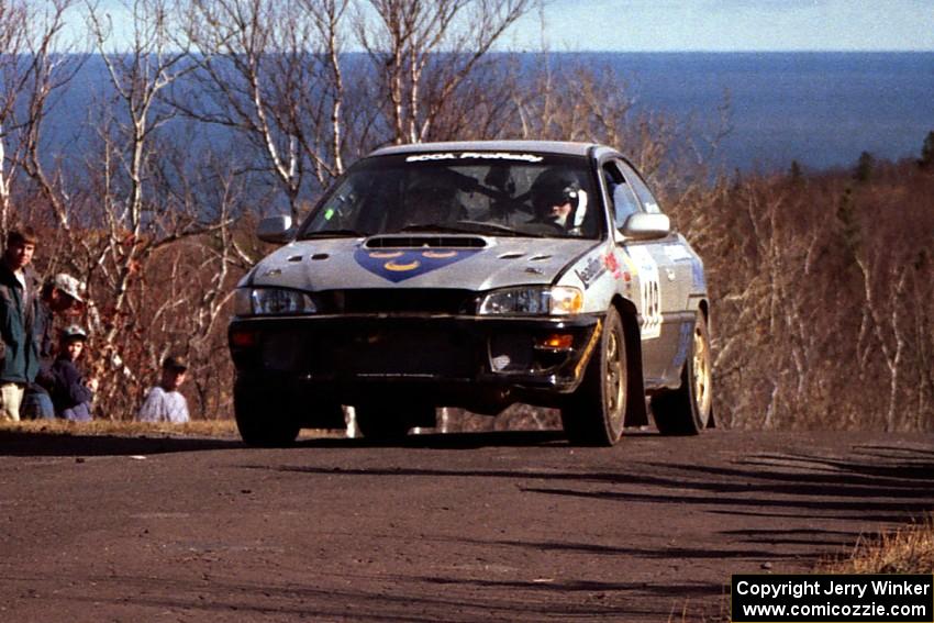 Jonathan Ryther / Janice Damitio Subaru Impreza 2.5RS at the final yump on SS13, Brockway Mountain.