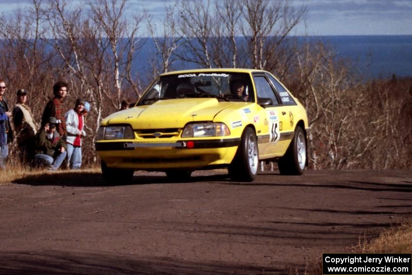 Don Rathgeber / Jimmy Brandt Ford Mustang LX at the final yump on SS13, Brockway Mountain.