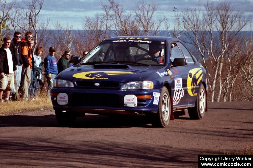 Patrick Lilly / Mark McAllister Subaru WRX at the final yump on SS13, Brockway Mountain.