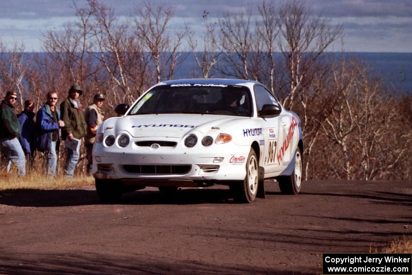 Perry King / Mark Williams Hyundai Tiburon at the final yump on SS13, Brockway Mountain.