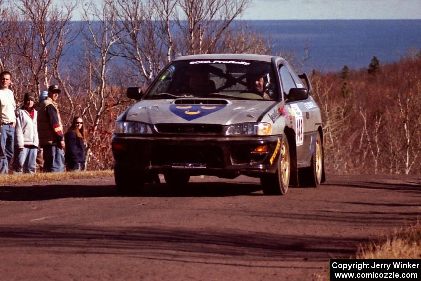 Lon Peterson / Bill Gutzmann Subaru Impreza 2.5RS at the final yump on SS13, Brockway Mountain.