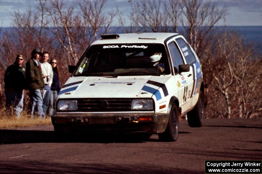 Eric Burmeister / Mark Buskirk VW GTI at the final yump on SS13, Brockway Mountain.