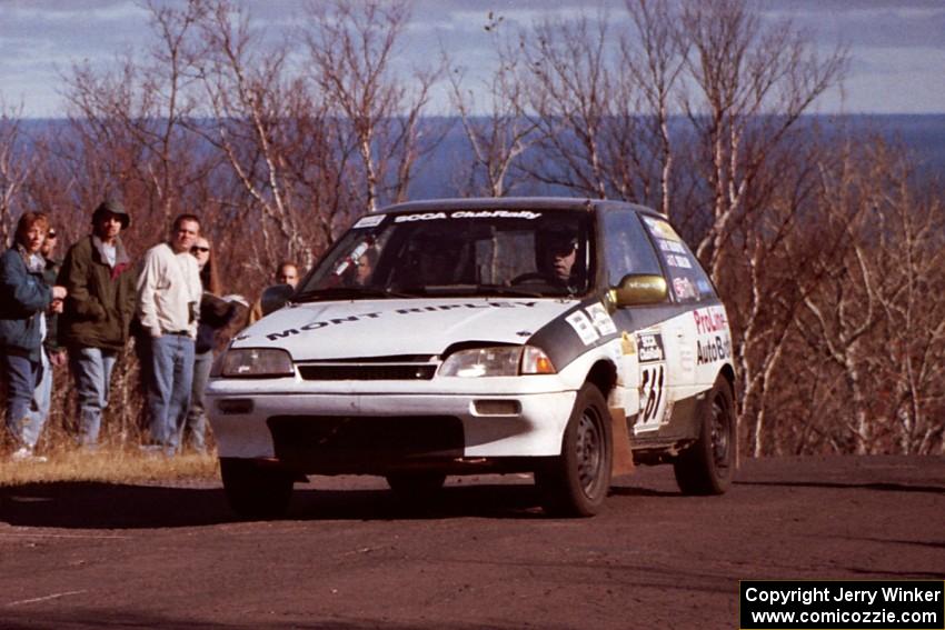 Pete Beaupre / Tim Ballon Suzuki Swift at the final yump on SS13, Brockway Mountain.