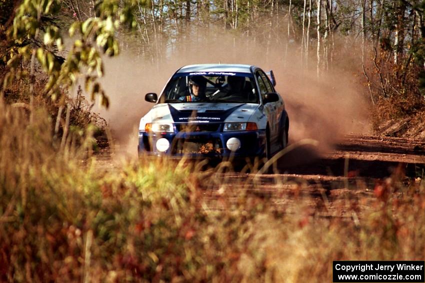 Karl Scheible / Russ Hughes Mitsubishi Lancer Evo V at speed near the end of SS17, Gratiot Lake II.