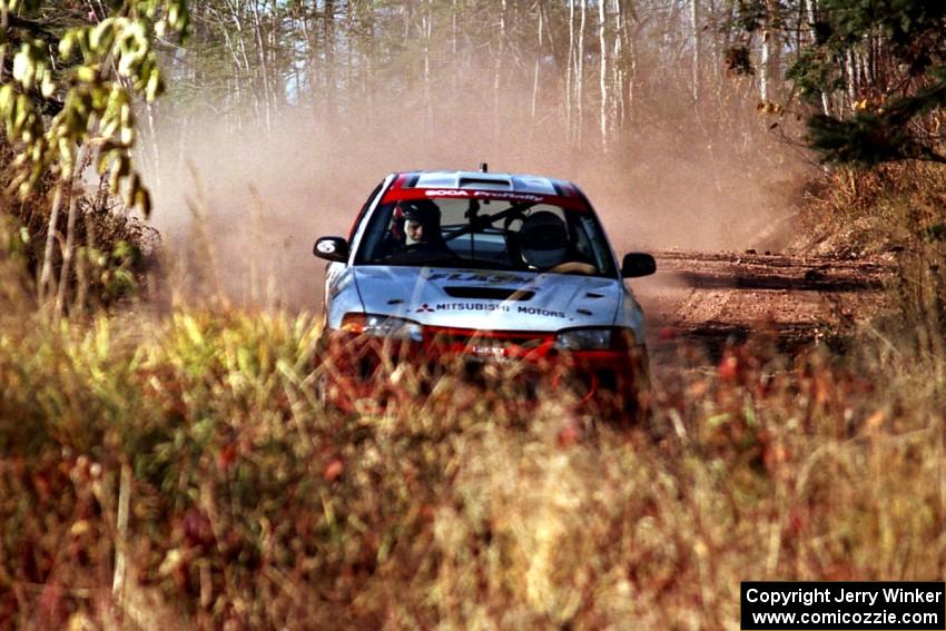 Garen Shrader / Michael Fennell Mitsubishi Lancer Evo IV at speed near the end of SS17, Gratiot Lake II.