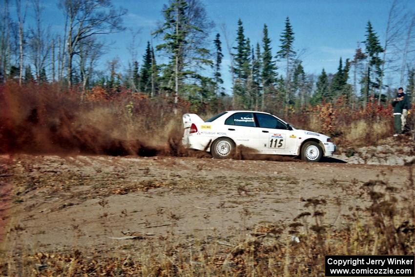 Seamus Burke / Frank Cunningham Mitsubishi Lancer Evo IV at speed near the end of SS17, Gratiot Lake II.