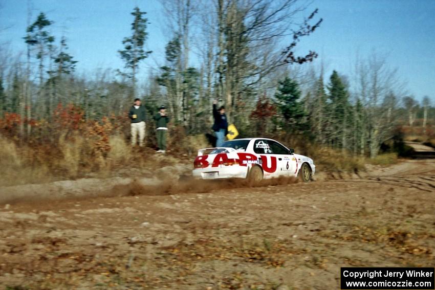 Henry Krolikowski / Cindy Krolikowski Subaru WRX STi at speed near the end of SS17, Gratiot Lake II.