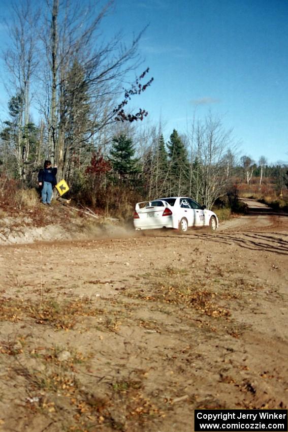 Tim Paterson / Scott Ferguson Mitsubishi Lancer Evo IV at speed near the end of SS17, Gratiot Lake II.