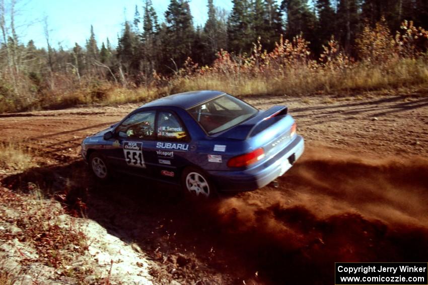 Mark Sarnecki / Rick Hansen Subaru Impreza 2.5RS at speed near the end of SS17, Gratiot Lake II.