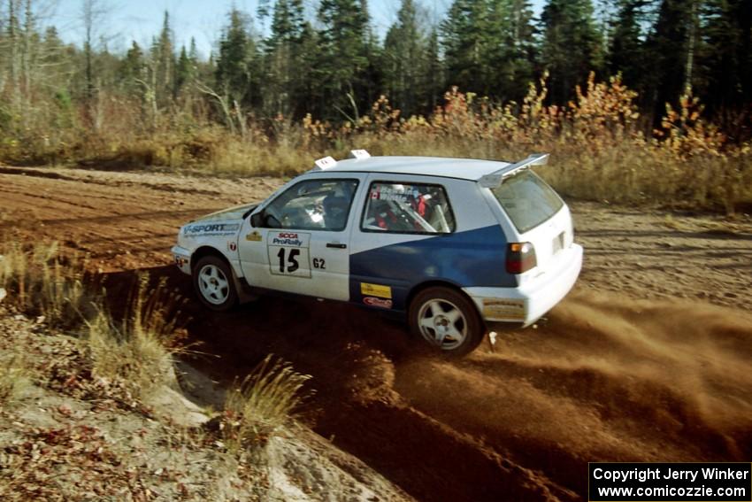 Brad Hawkins / Adrian Wintle VW GTI at speed near the end of SS17, Gratiot Lake II.