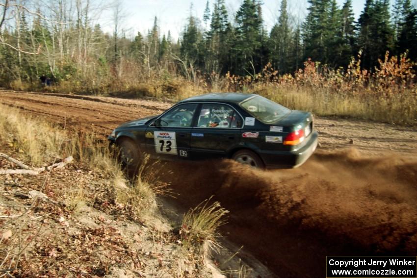 Nick Robinson / Carl Lindquist Honda Civic at speed near the end of SS17, Gratiot Lake II.