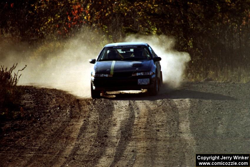 Steve Nielsen / Lisa Parker Plymouth Laser at speed near the end of SS17, Gratiot Lake II.