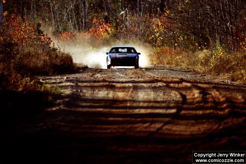 Kurt Winkelmann / Drew Ritchie Pontiac Fiero at speed near the end of SS17, Gratiot Lake II.