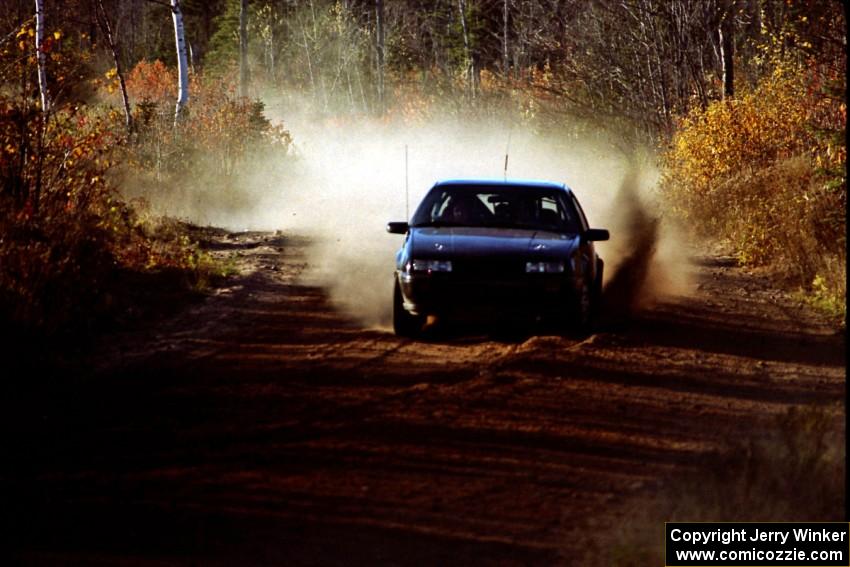 Anthony Grinnell / Kim Young Chevy Beretta at speed near the end of SS17, Gratiot Lake II.