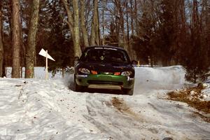 Tad Ohtake / Bob Martin Ford Escort ZX2 sets up for the hairpin on SS5, Ranch II.