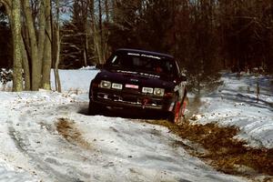 Mike Hurst / Rob Bohn Pontiac Sunbird Turbo sets up for the hairpin on SS5, Ranch II.