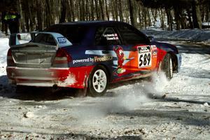 Alec Ellsworth /	Steve Kaczkowski Mitsubishi Lancer Evo IV recovers from an off at the hairpin on SS5, Ranch II.