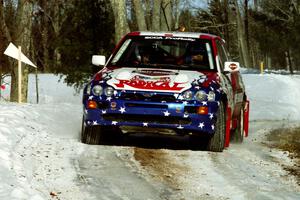 Kurosh Jahromi / Tony Lumino Ford Escort Cosworth RS sets up for the hairpin on SS5, Ranch II.