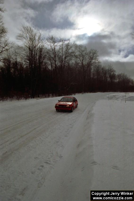 Gail Truess / Pattie Hughes-Mayer Mazda 323GTX at speed on SS4, Avery Lake.