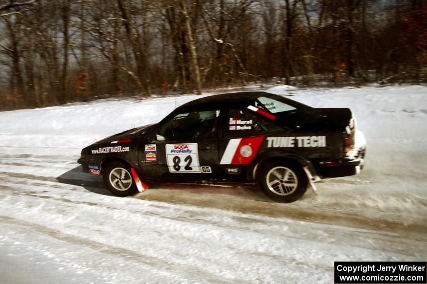 Mike Hurst / Rob Bohn Pontiac Sunbird Turbo at speed on SS4, Avery Lake.