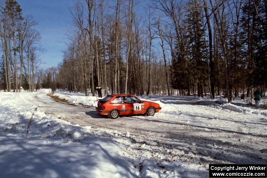 Gail Truess / Pattie Hughes-Mayer Mazda 323GTX at the hairpin on SS5, Ranch II.