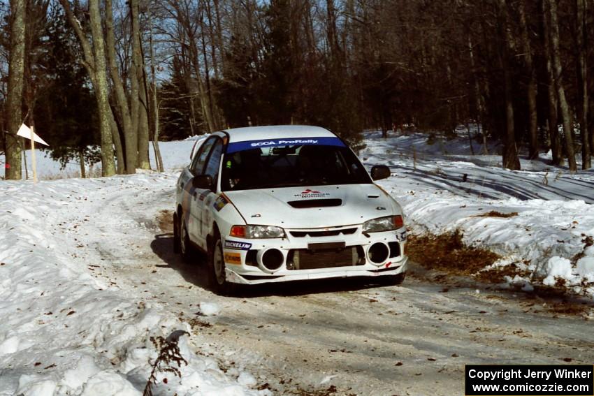 Pete Lahm / Matt Chester Mitsubishi Lancer Evo IV sets up for the hairpin on SS5, Ranch II.