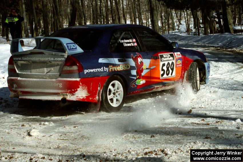 Alec Ellsworth /	Steve Kaczkowski Mitsubishi Lancer Evo IV recovers from an off at the hairpin on SS5, Ranch II.