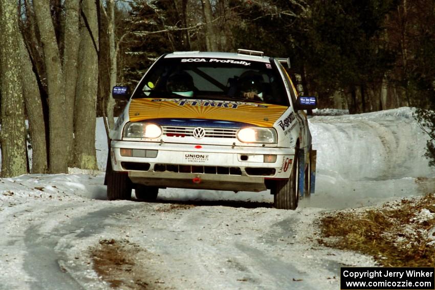 Brad Hawkins / Adrian Wintle VW GTI sets up for the hairpin on SS5, Ranch II.