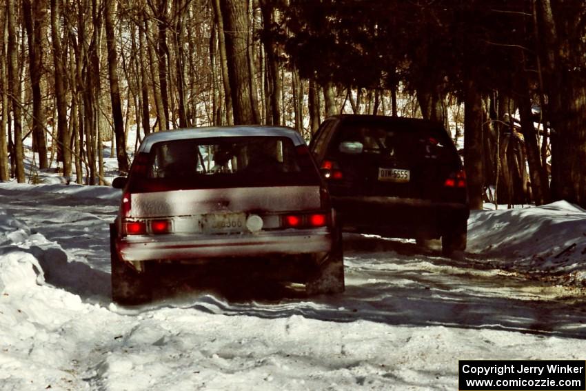 Jerry Brownell / Jim Windsor Chevy Citation about to pass the William Tremmel / Peter Coleman VW GTI after the hairpin on SS5.