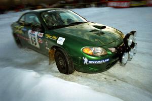 Tad Ohtake / Bob Martin Ford Escort ZX2 at the spectator corner on SS11, Hungry 5.