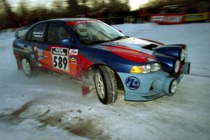 Alec Ellsworth /	Steve Kaczkowski Mitsubishi Lancer Evo IV at the spectator corner on SS11, Hungry 5.