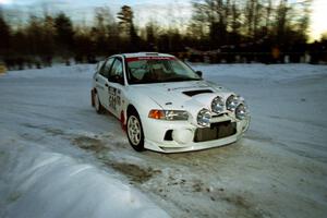 Paul Dunn / Rebecca Dunn Mitsubishi Lancer Evo IV at the spectator corner on SS11, Hungry 5.