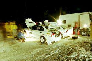 Seamus Burke / Frank Cunningham and Paul Dunn / Rebecca Dunn Mitsubishi Lancer Evo IVs at the final service.