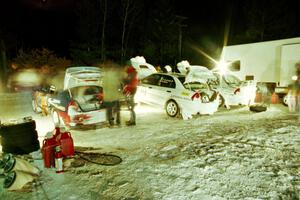 Three of the TAD Mitsubishi Lancer Evo IVs at the final service in Atlanta.