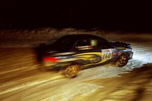 Eric Eaton / Kenny Almquist Subaru Impreza at the spectator corner on SS13, Meaford/DeCheau Lake.