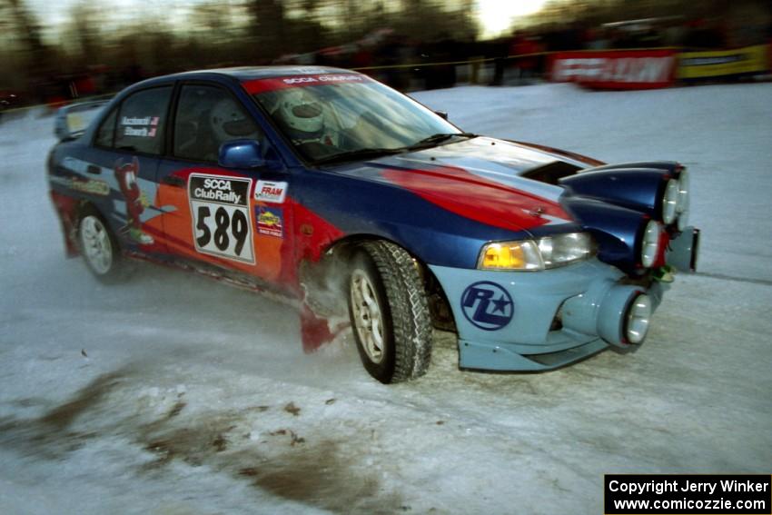 Alec Ellsworth /	Steve Kaczkowski Mitsubishi Lancer Evo IV at the spectator corner on SS11, Hungry 5.