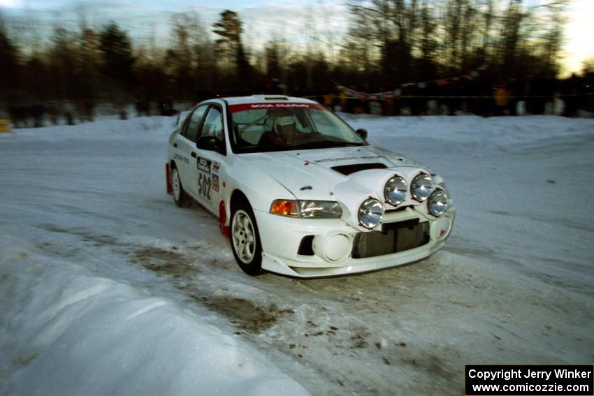 Paul Dunn / Rebecca Dunn Mitsubishi Lancer Evo IV at the spectator corner on SS11, Hungry 5.