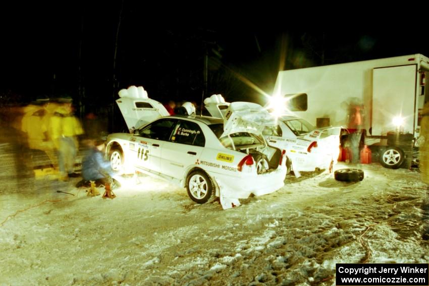 Seamus Burke / Frank Cunningham and Paul Dunn / Rebecca Dunn Mitsubishi Lancer Evo IVs at the final service.