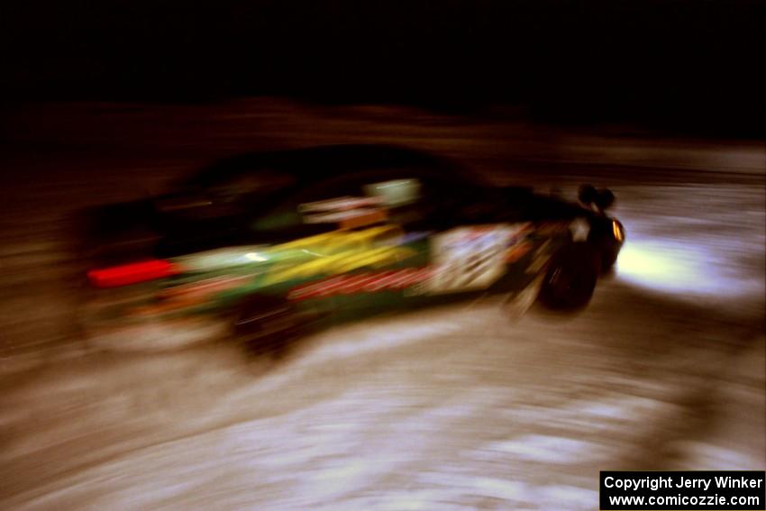 Tad Ohtake / Bob Martin Ford Escort ZX2 at the spectator corner on SS13, Meaford/DeCheau Lake.